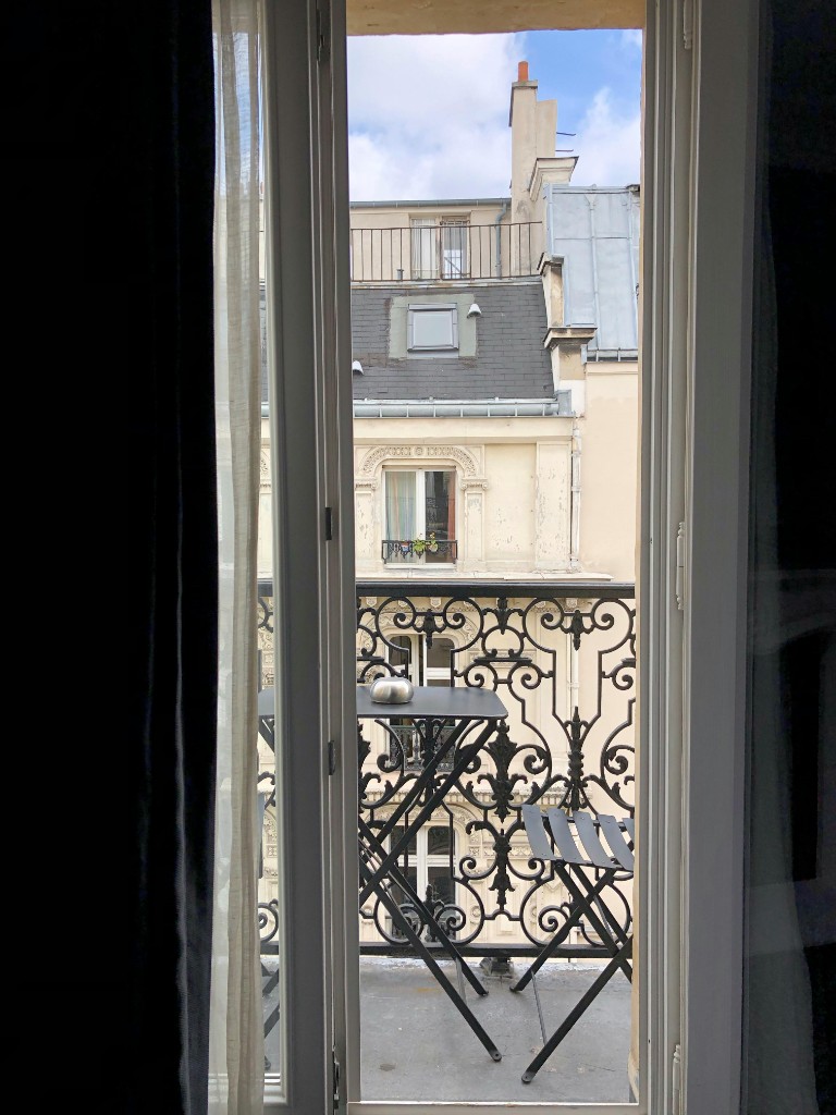 View through French doors to a balcony
