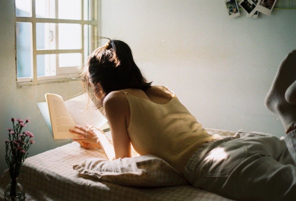 Woman reading in bed